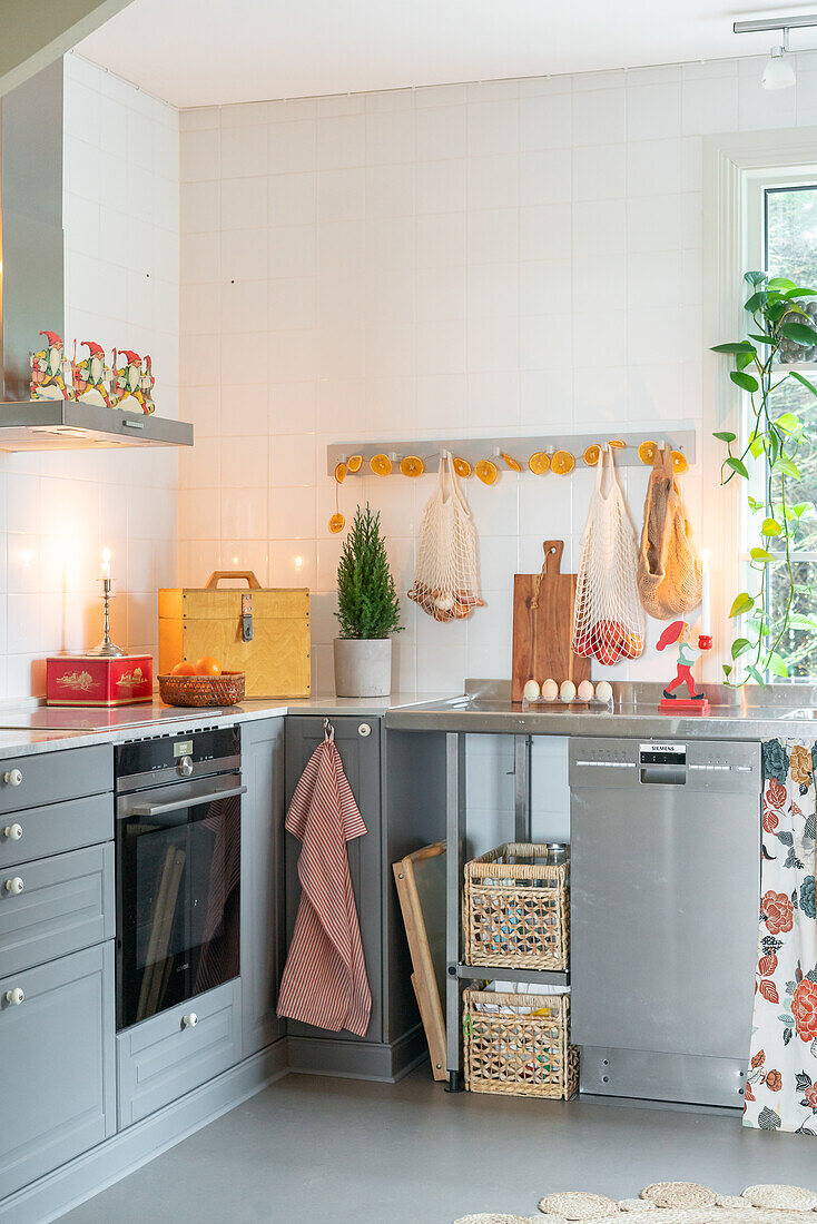 Kitchen with grey cabinets and Christmas decoration