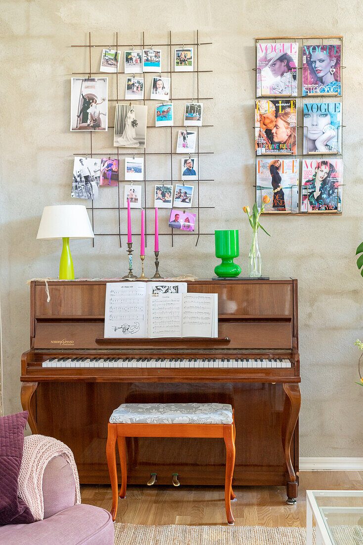 Piano, decorative wall grille and wall magazine holder