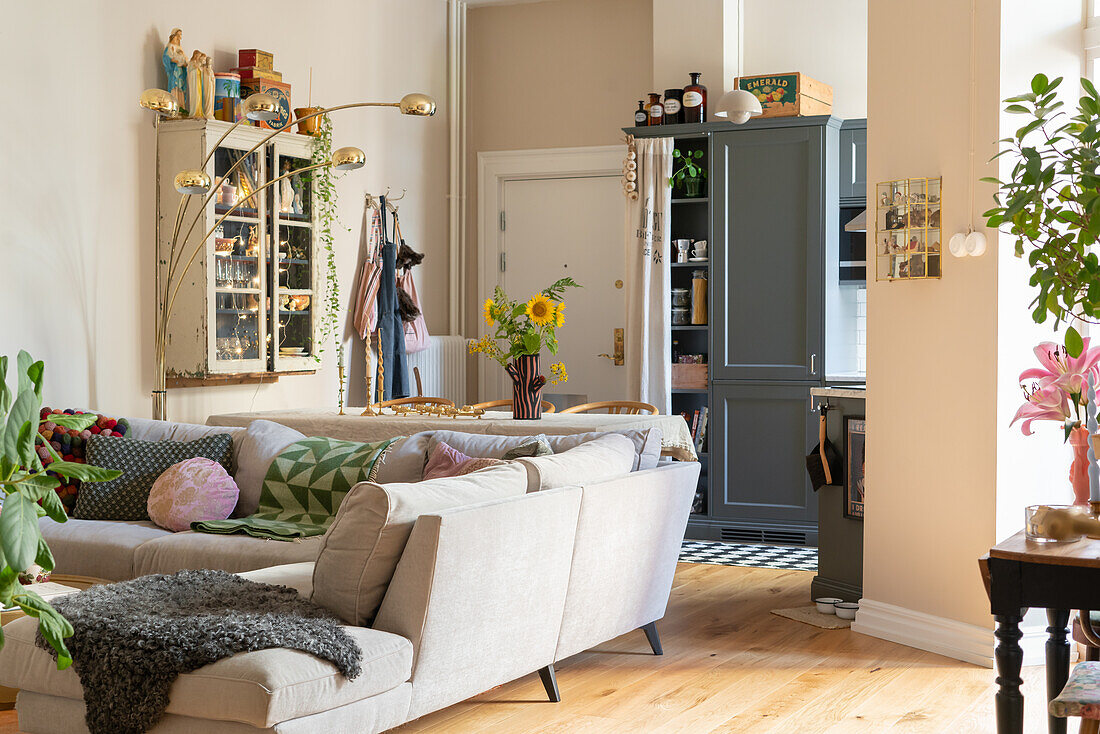 Bright living room with corner sofa and decorative accessories