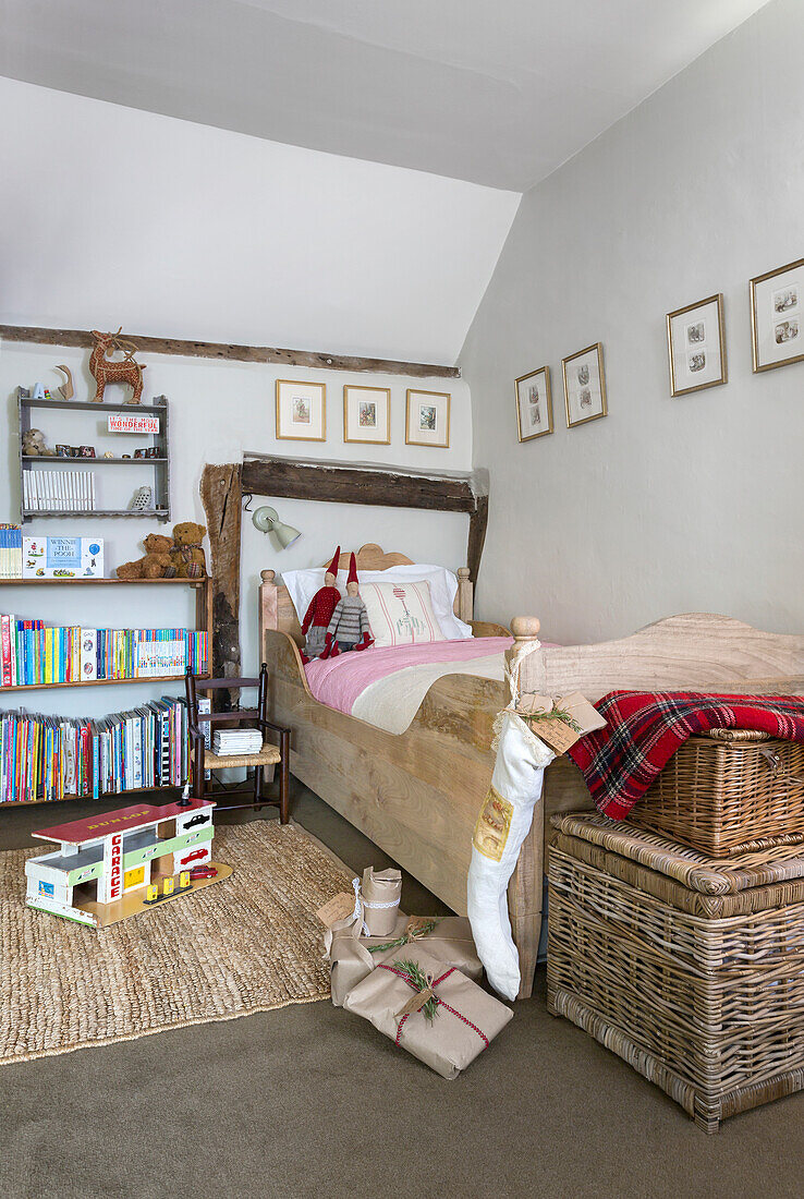 Rustic bedroom with wooden bed and Christmas decorations