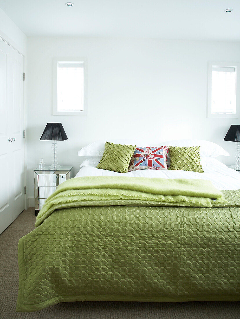 Bedroom with green bedspread