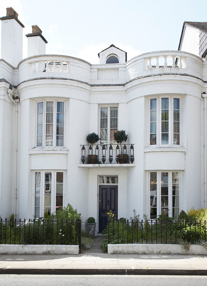 White facade of historic Winchester home, Hampshire, UK