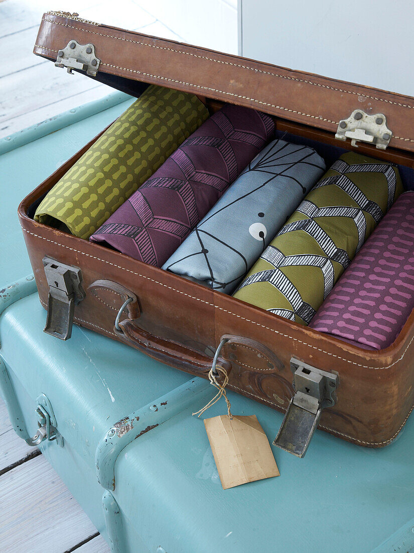 Vintage suitcase with fabric samples in Winchester, Hampshire, UK