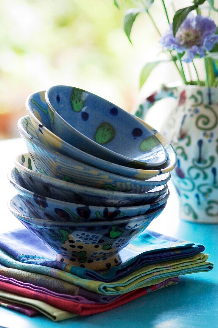 Stack of decorative crockery on a tabletop