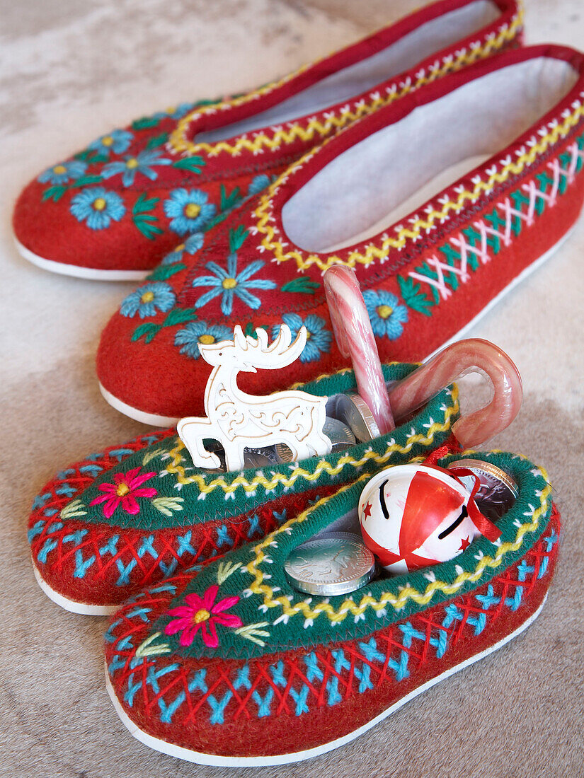 Hand stitched Christmas slippers with sweets and toys, Poland