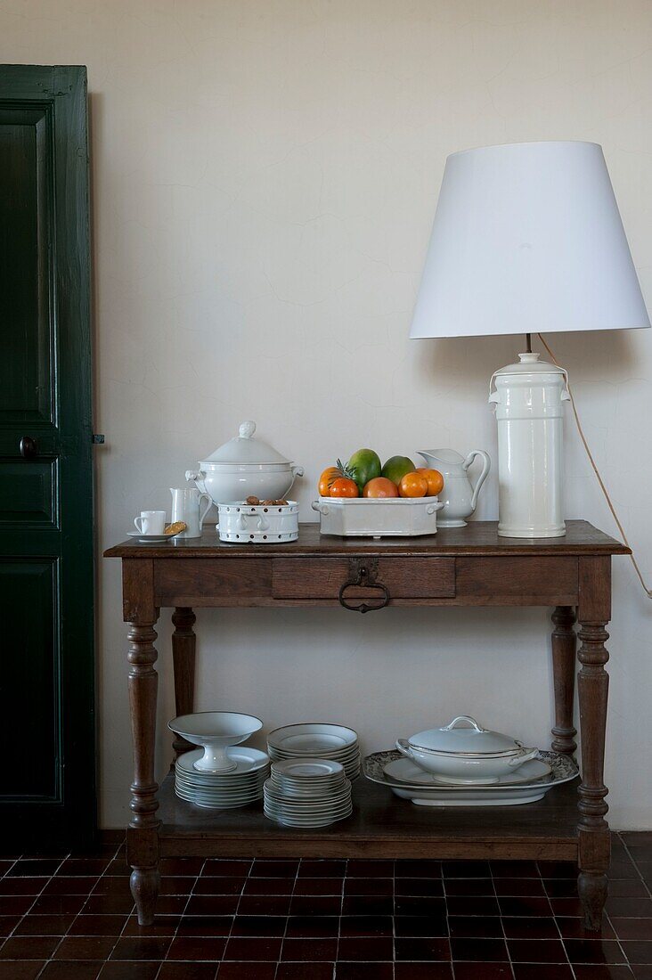 Set of white crockery on small table