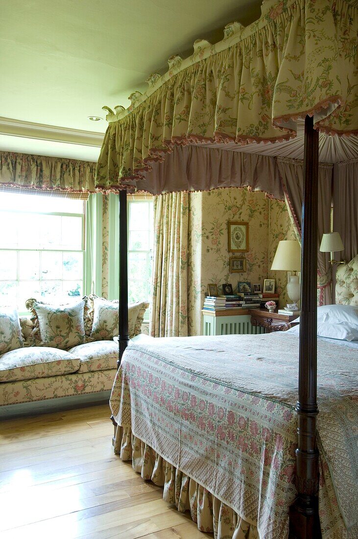 Double bed with canopy in rustic bedroom