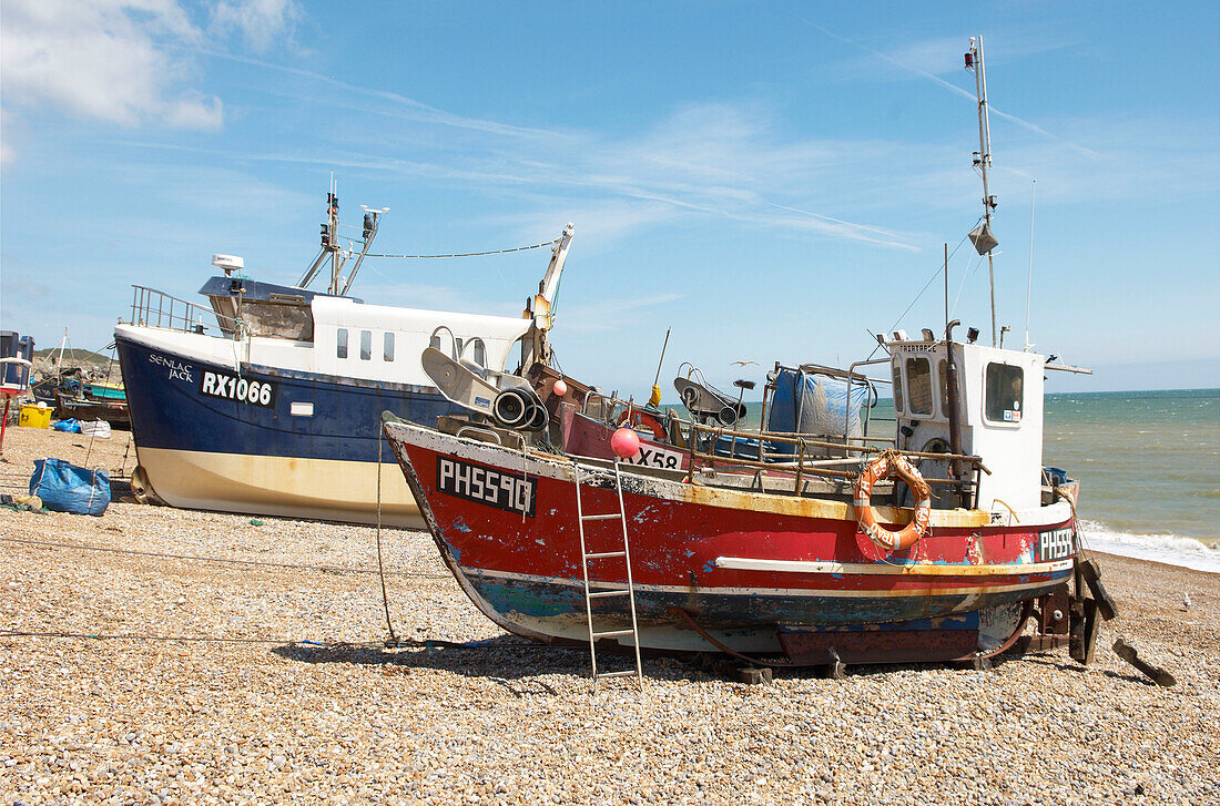 Fishing boat on shingle beach in Hastings Old Town England UK