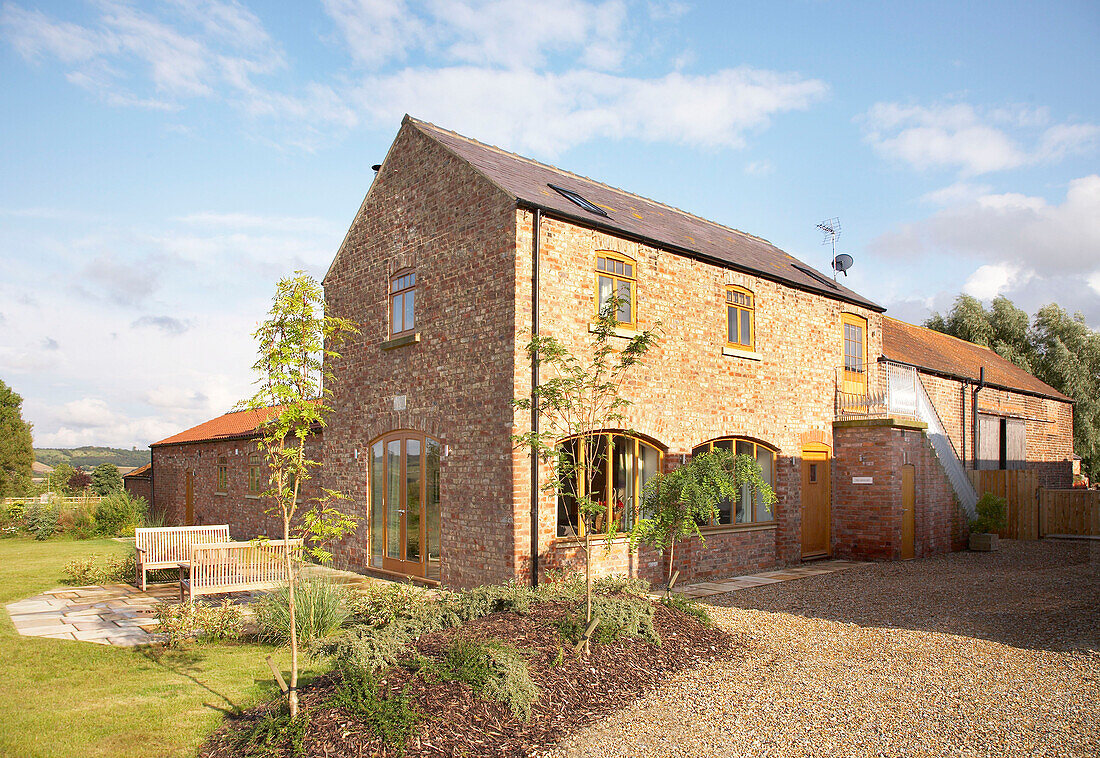 Red brick modern farm house