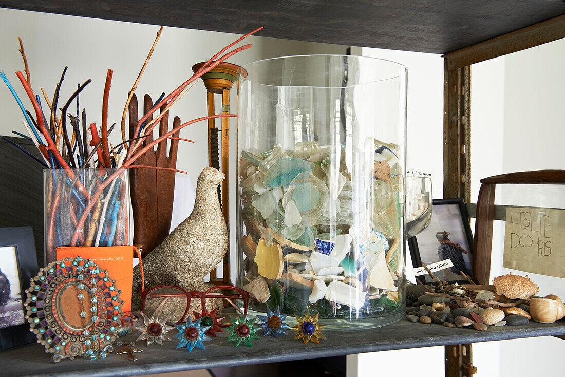 Seashells and pebbles with jewellery on shelving unit in Sheffield home, Berkshire County, Massachusetts, United States