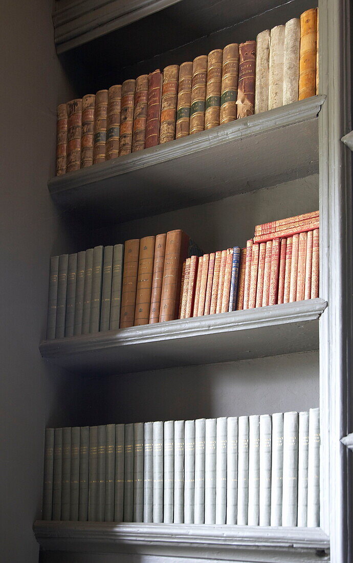 Hardbacked reference books in Laughame townhouse, Wales, UK