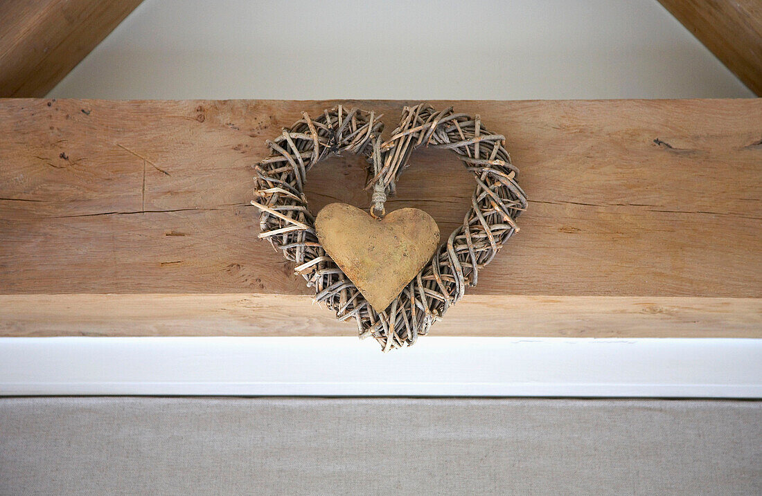 Hearts on timber frame in Gloucestershire cottage England UK