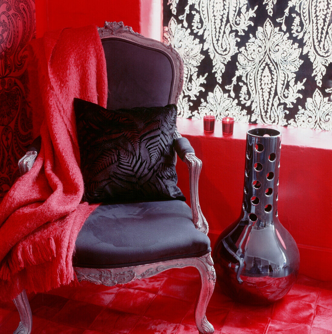 Detail of a red and black living room corner