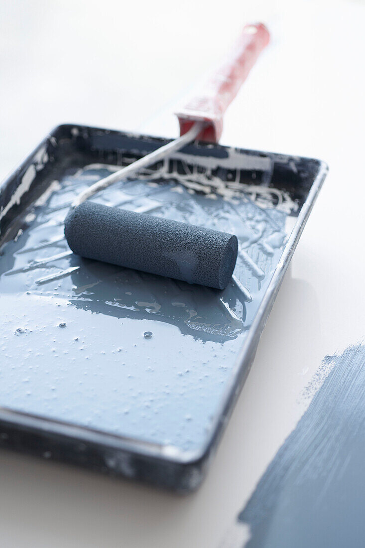 Paint tray and roller in UK home