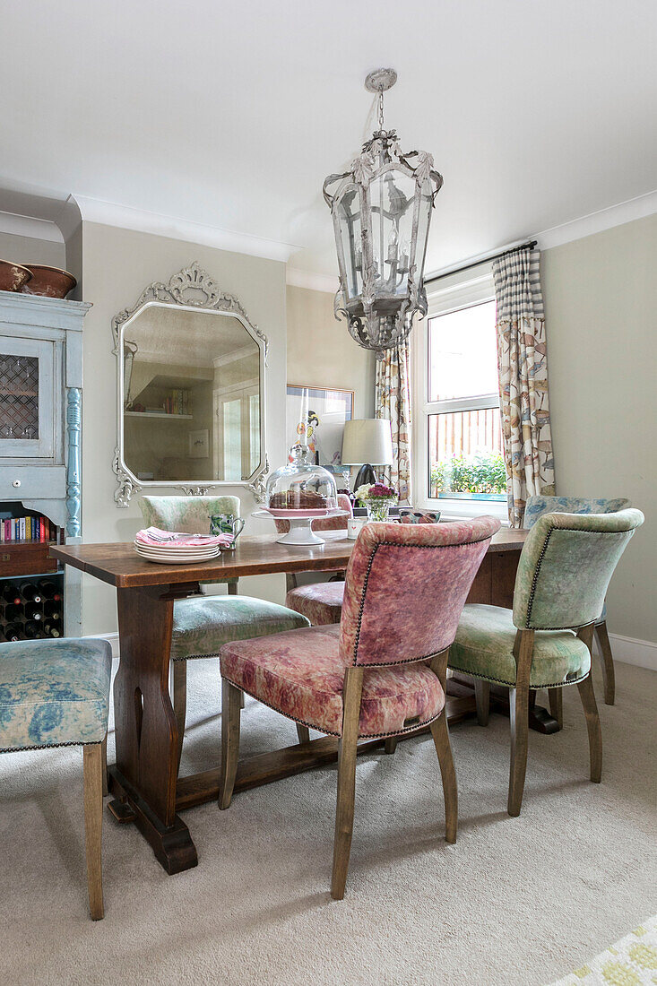 Crushed velvet dining chairs and vintage wooden table in Victorian terrace Alton UK