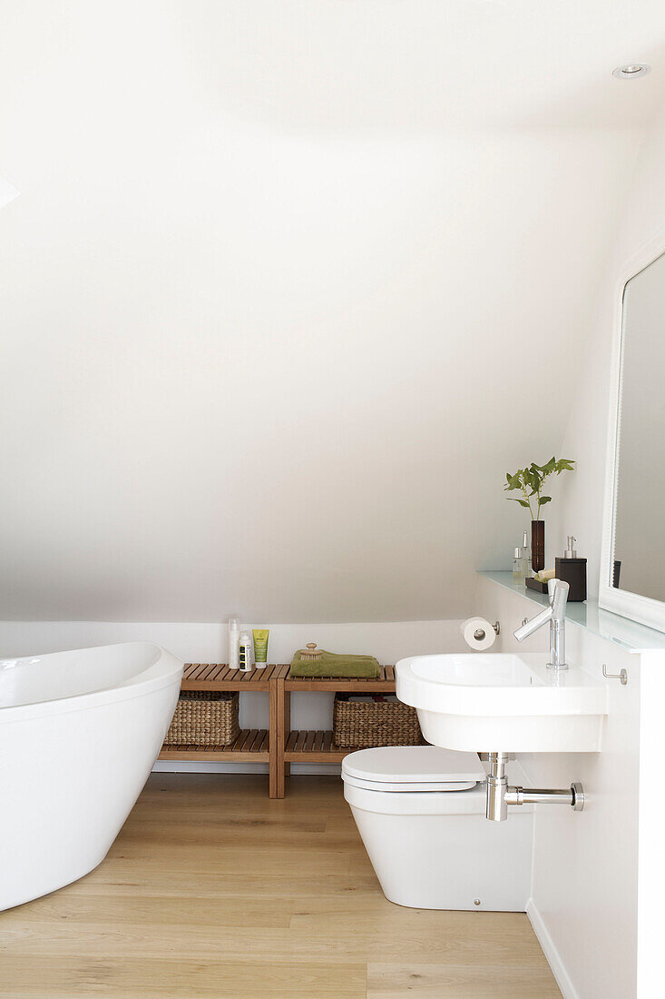 Freestanding bath in attic conversion of London home