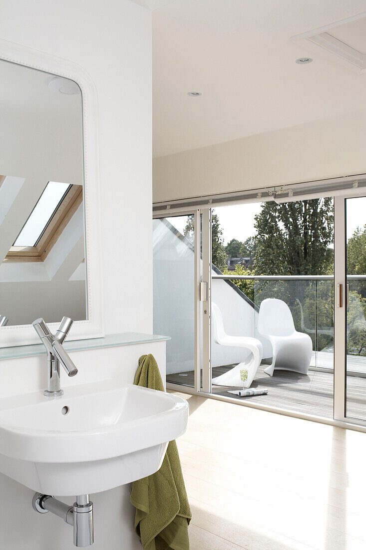 Washbasin and sliding doors of self-contained London apartment