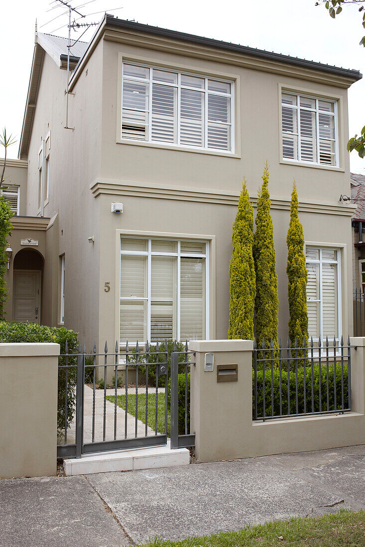 Fenced garden and front facade of Sydney home Australia