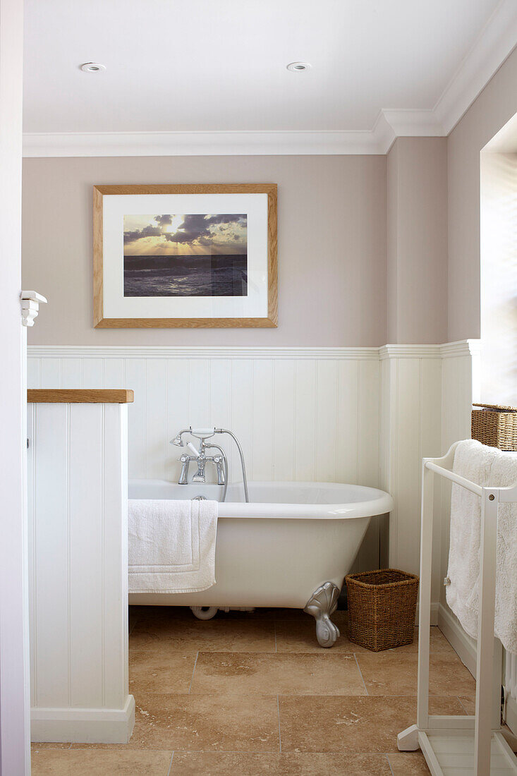 Freestanding bath in Bembridge beach house, Isle of Wight, England, UK