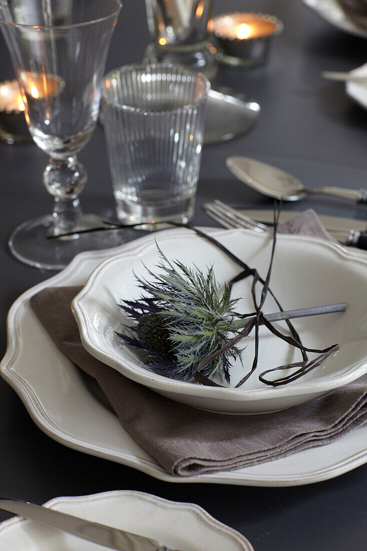 Place setting with thistle on Brook table in Isle of Wight home, UK