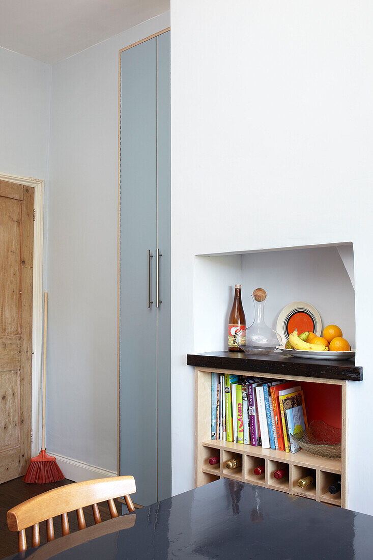 Light blue storage cupboard in kitchen of Isle of Wight home UK