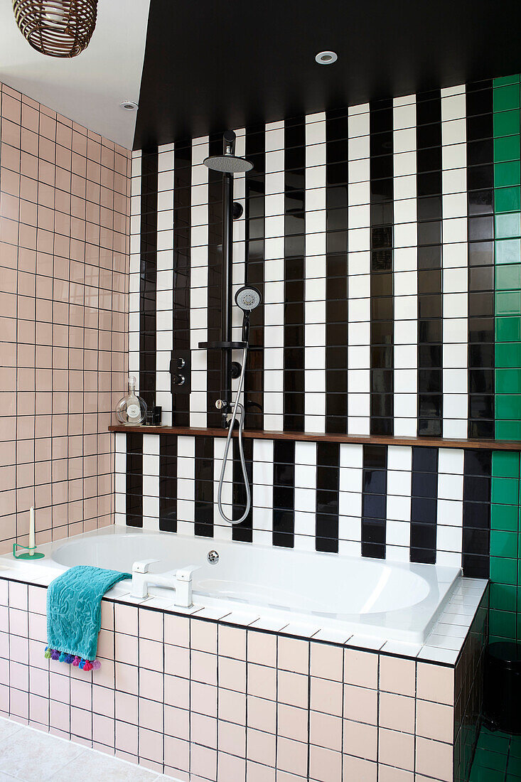 Retro style tiled bathroom in Hastings townhouse East Sussex England UK