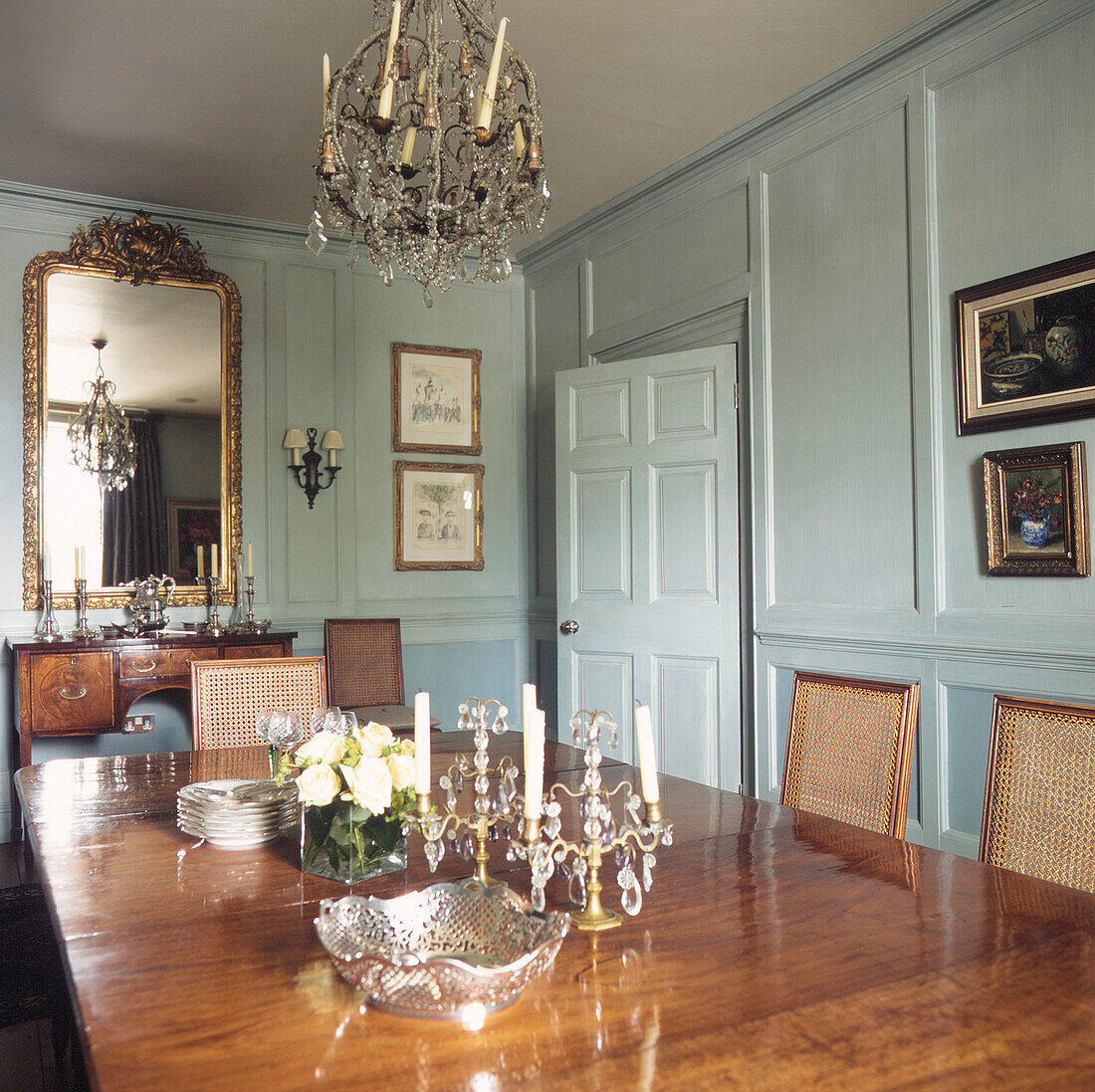 Elegant panelled dining room with formal Georgian dining table