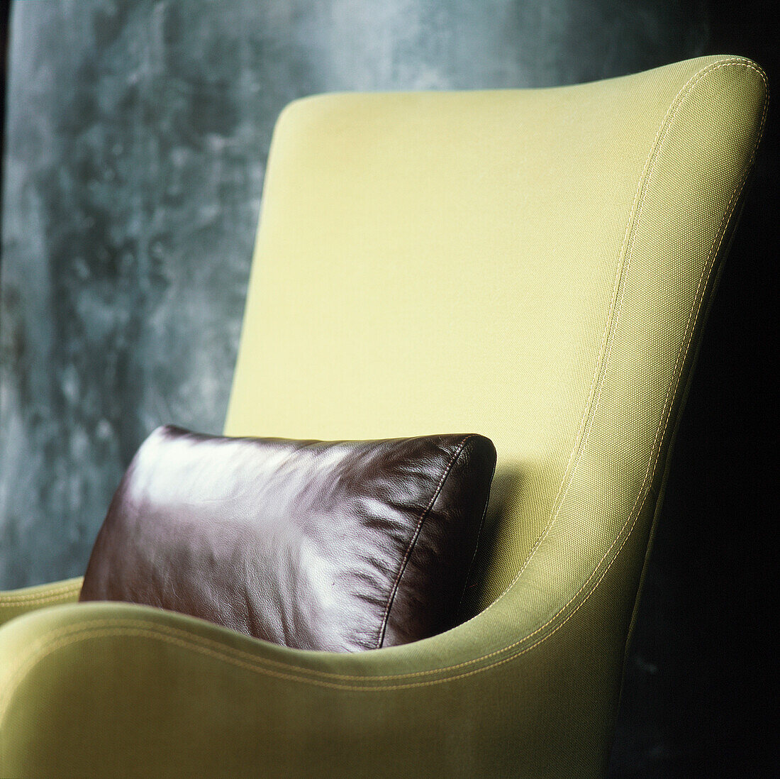 Upholstered suede chair