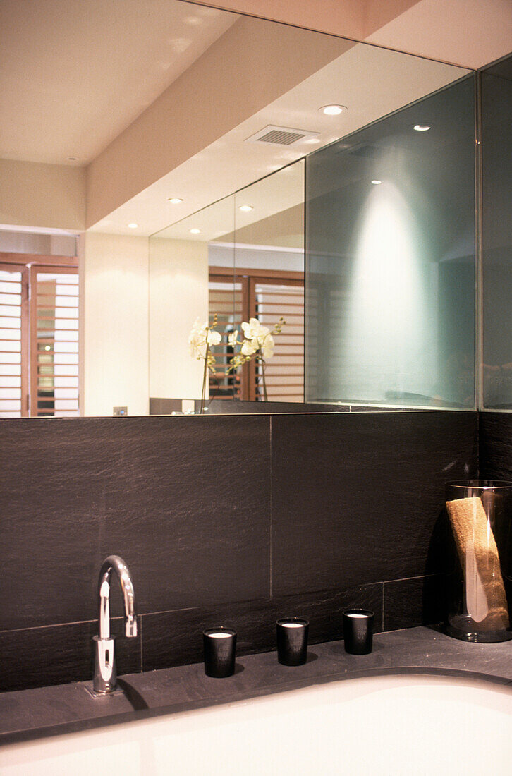 Bathroom detail with mirror and slate tiles