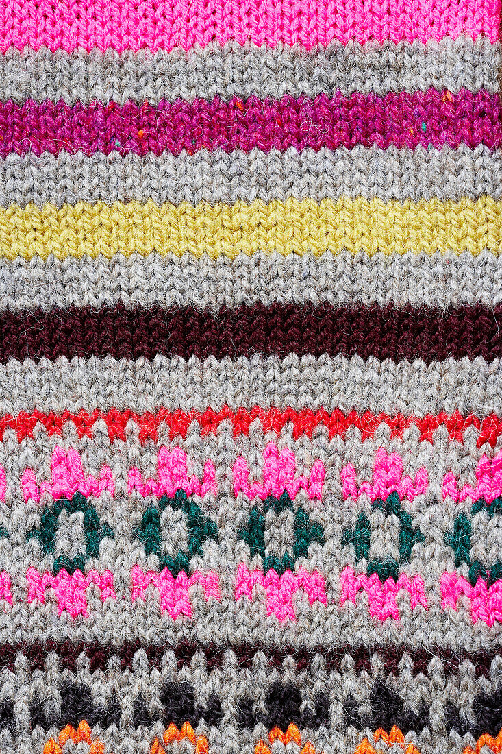 Close up of colourful patterned knitwear