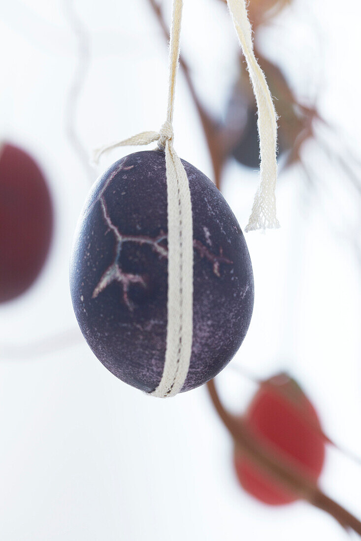 Decorated Easter Eggs tied with ribbon