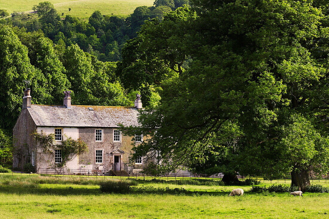 Stone exterior of rural Cumbrian farmhouse, England, UK