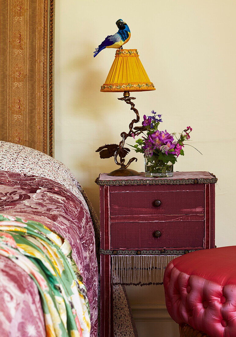 Vintage lamp on bedside table in Cumbrian farmhouse, England, UK