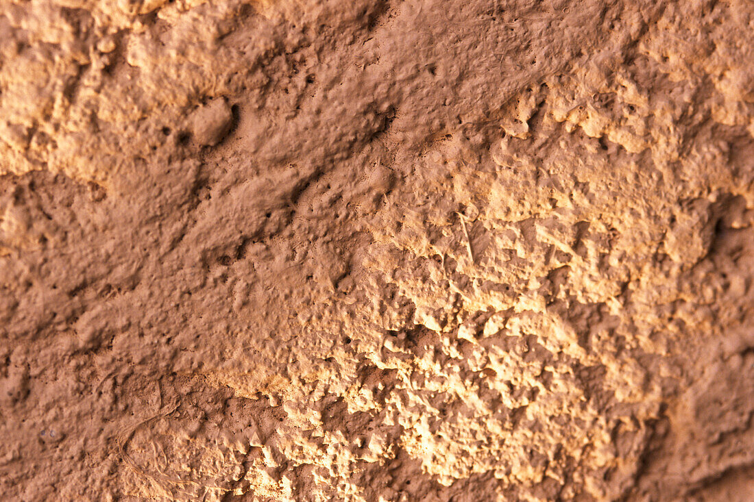 Close up of rough terracotta mud wall