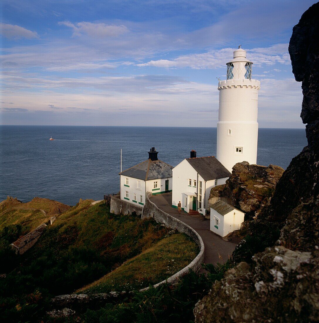 Lighthouse on sea cliff