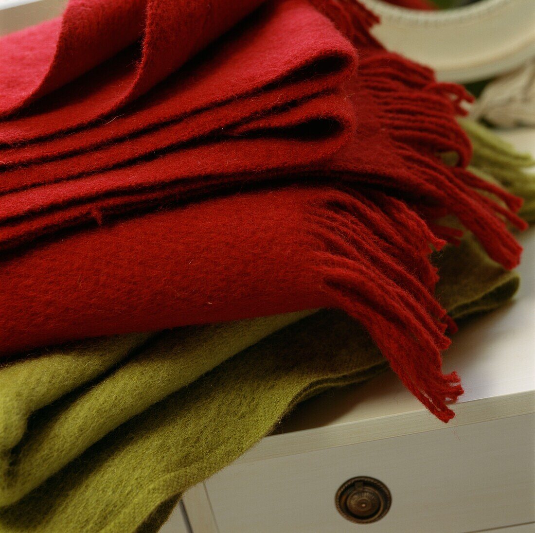 Red and green folded blankets