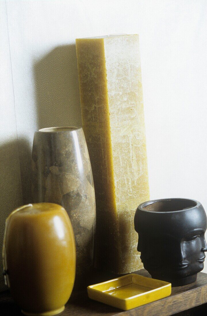 Still life with candles and vases
