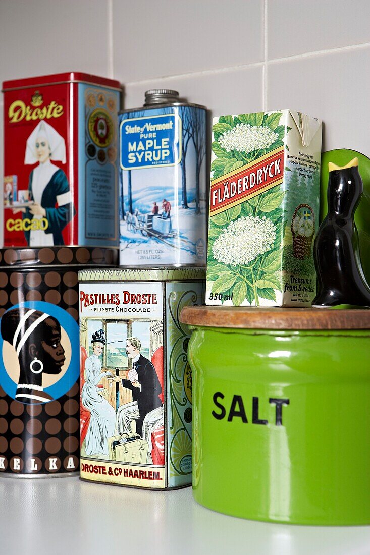 Old fashioned storage tins and salt in London kitchen