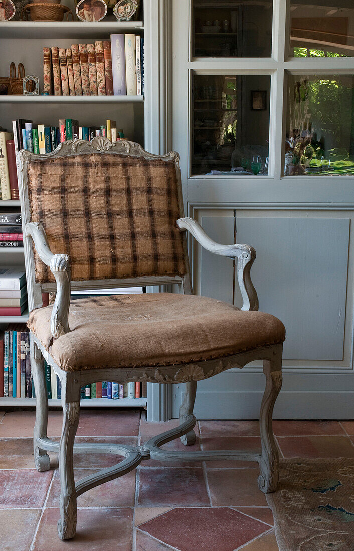 Chair by bookshelf