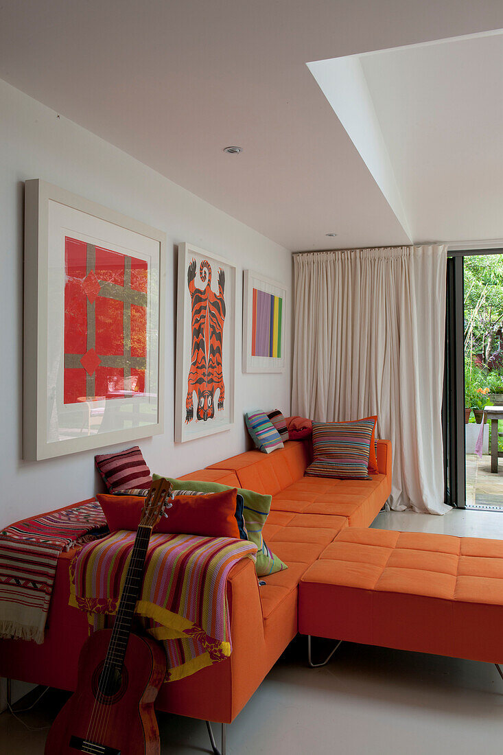 Orange modular seating in contemporary Lewes home,  East Sussex,  England,  UK