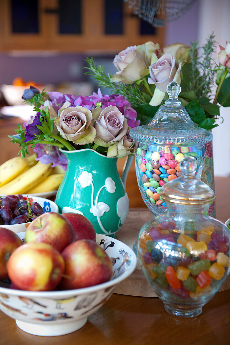 Fruit in bowls and sweets in jars in Tiverton country home,  Devon,  England,  UK