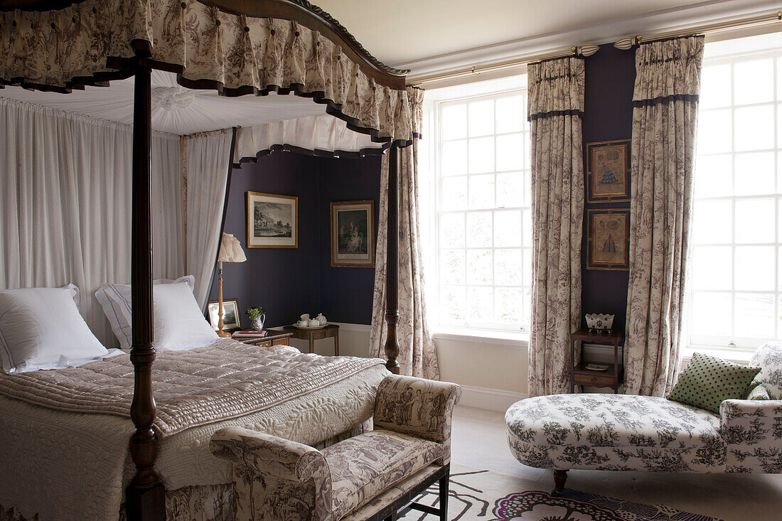 Four postered bed in room with co-ordinating fabrics,  Tiverton country home,  Devon,  England,  UK