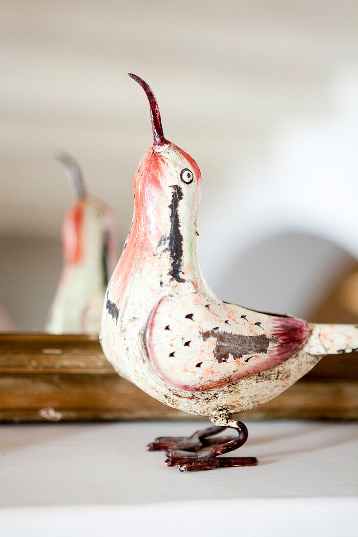 Bird ornament on mantlepiece in Castro Marim Portugal
