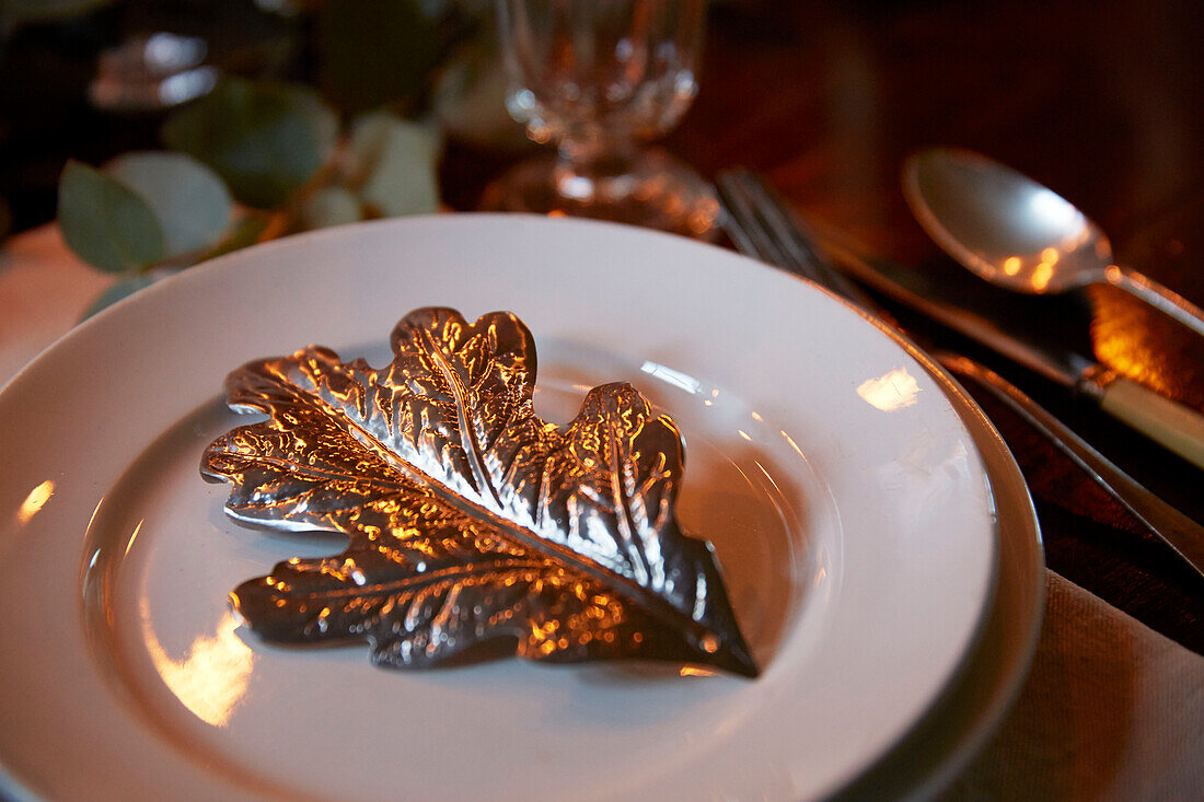 Silver leaf on place setting  Rochester  Kent  UK