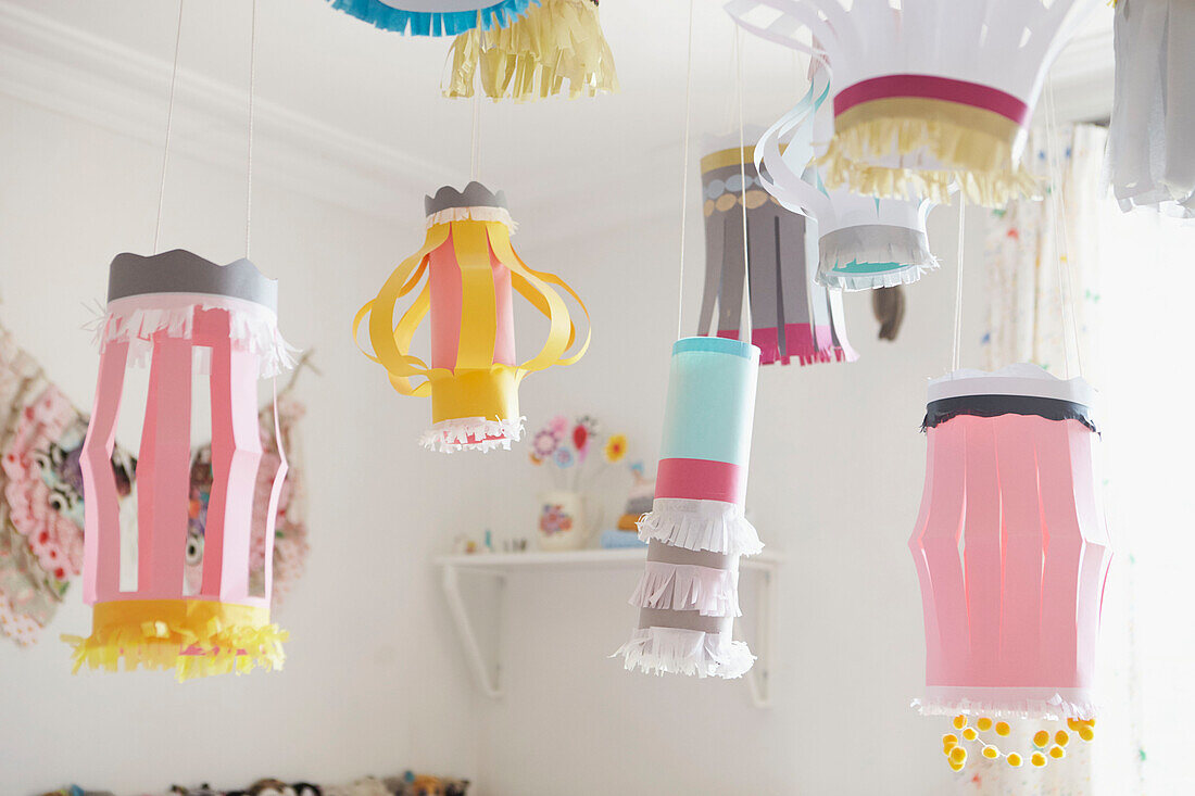 Handmade paper lanterns hang in child's room of Sheffield home  Yorkshire  UK