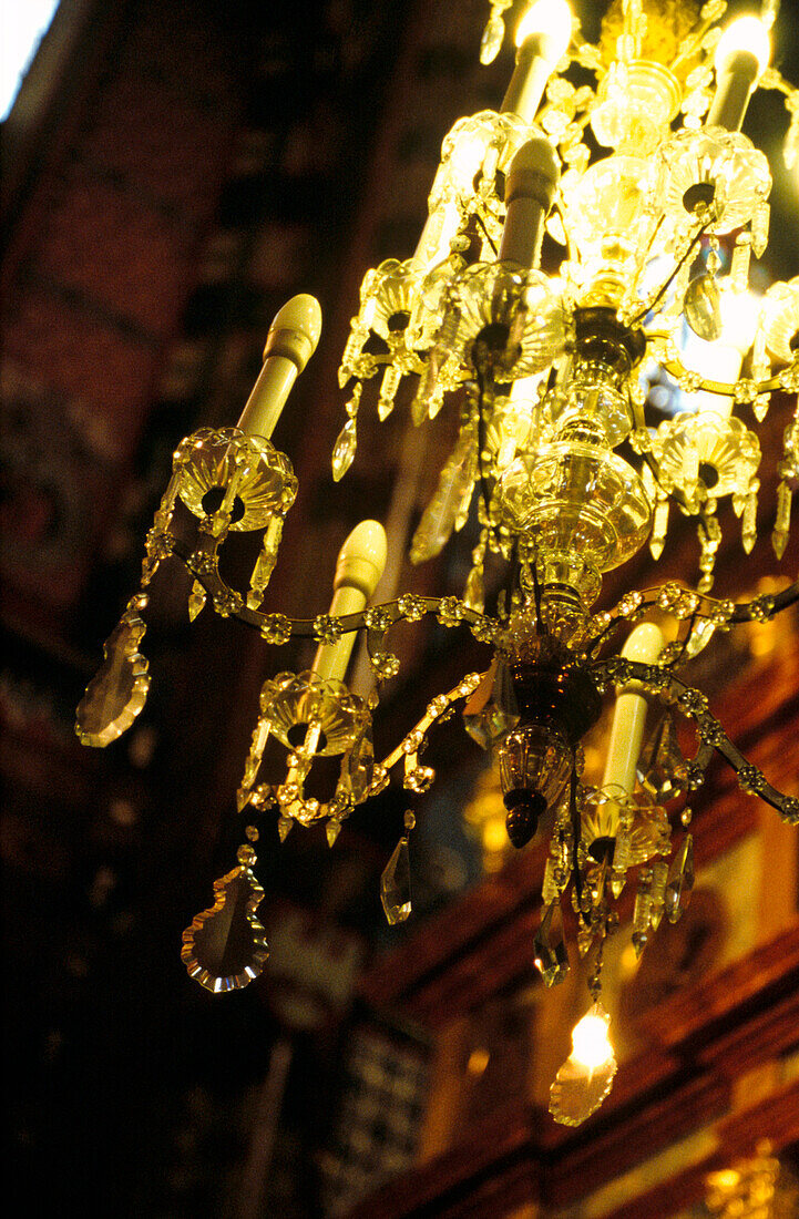 Cut glass chandelier in cafe bar