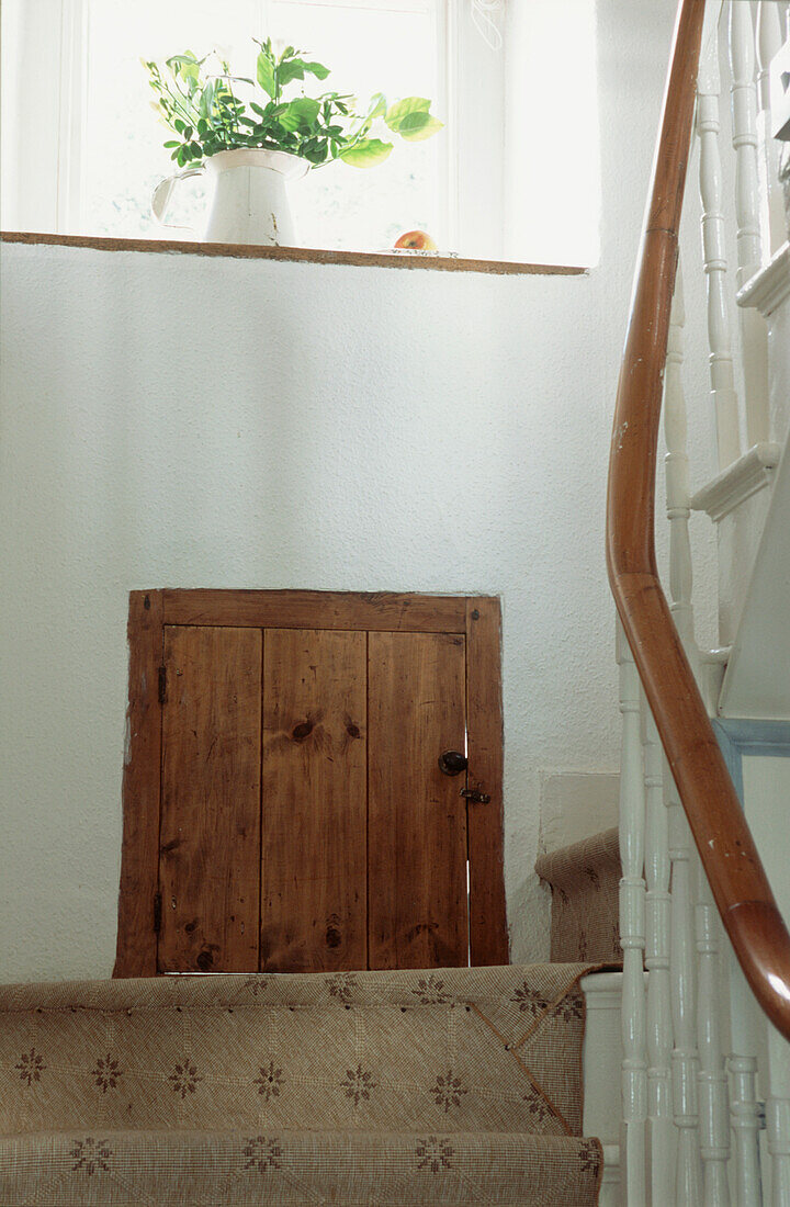 Window and cupboard on staircase