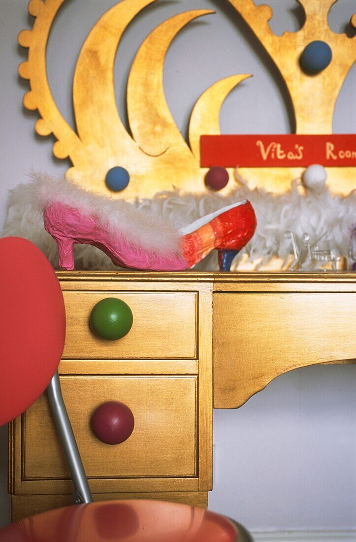 Close up of girl's dressing table with papier Mache shoes