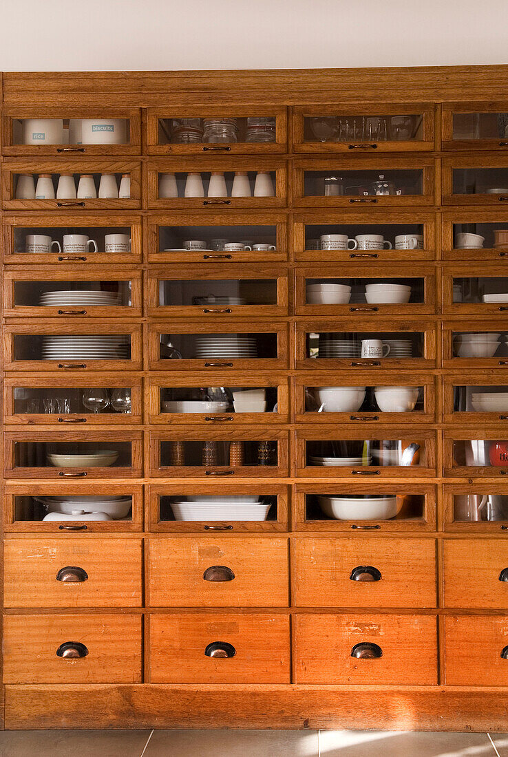 Kitchen cupboard filled with crockery