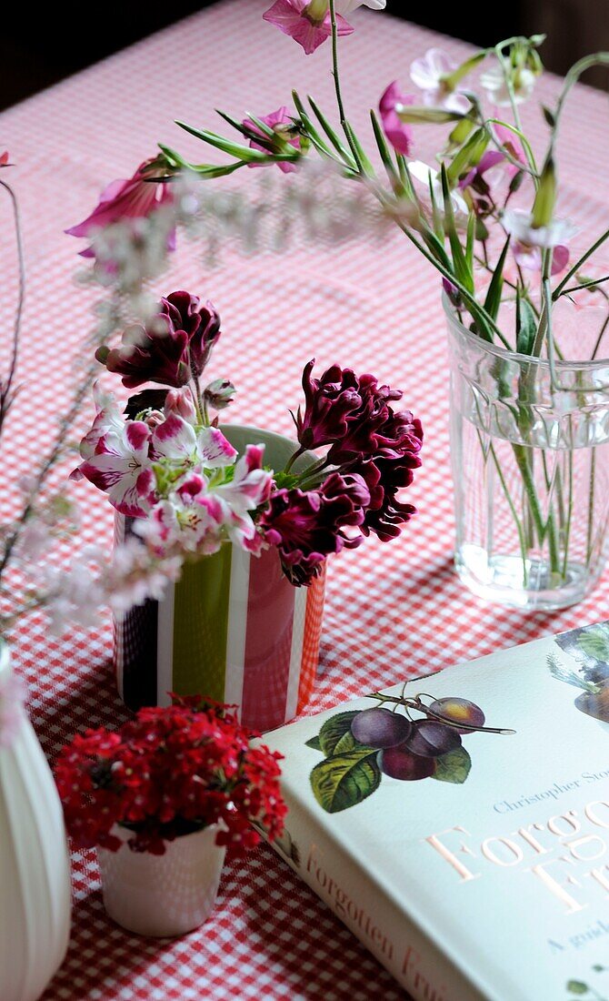 Flowers and book on table